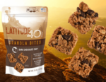 bag of latitude 40 dark chocolate chip granola bites with 4 granola bites next to it with mountain background